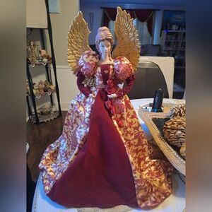 Festive Angel Figurine with Gold Wings and Red Gown